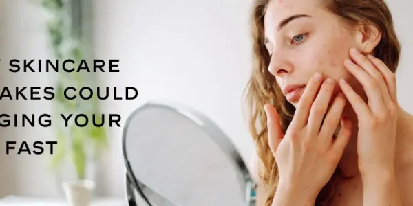Woman examining skin irritation in mirror with text 5 DIY Skincare Mistakes Could Be Aging Your Skin Fast