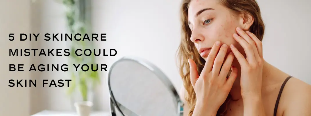 Woman examining skin irritation in mirror with text 5 DIY Skincare Mistakes Could Be Aging Your Skin Fast