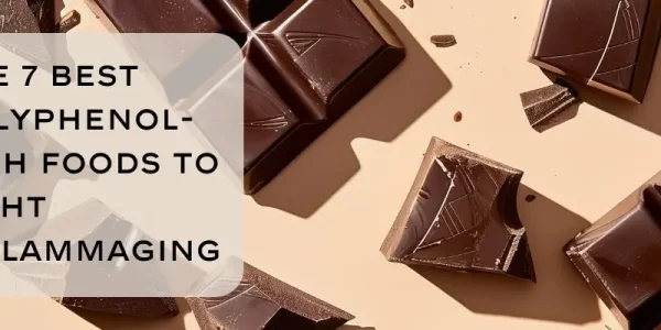 Broken dark chocolate pieces are scattered on a beige surface. Overlaid text reads, "The 7 Best Polyphenol-Rich Foods to Fight Inflammaging."