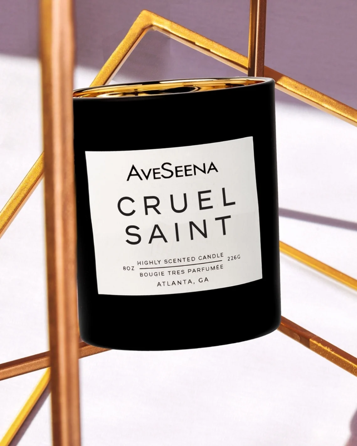 cruel saint candle in a lifestyle picture