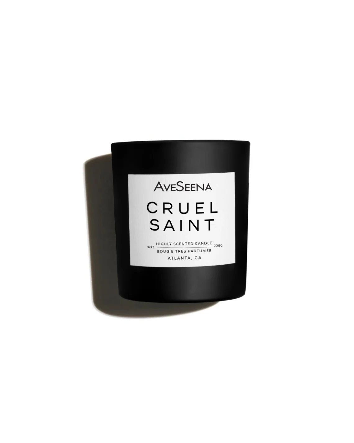 cruel saint candle on a white surface